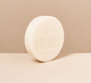 Savon solide pour faire la vaisselle à la main rond et blanc